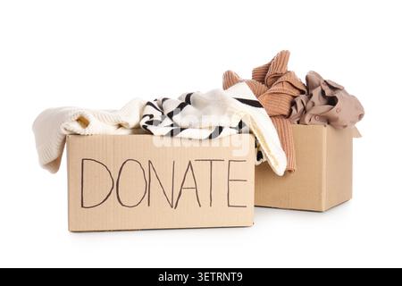 Cardboard boxes filled with clothes for donation Stock Photo