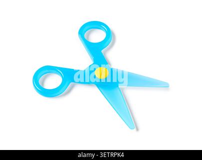 Blue plastic childrens scissors on white background Stock Photo