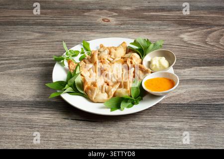 A view of a plate of cream cheese dumplings. Stock Photo