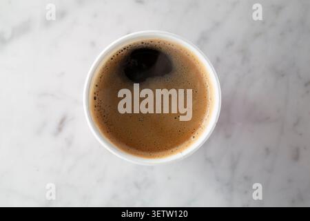 A top down view of a cup of black coffee. Stock Photo