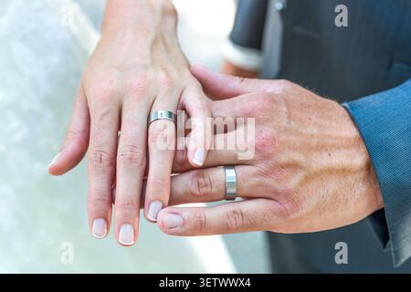 Hands of bride and groom, Wedding Rings Stock Photo