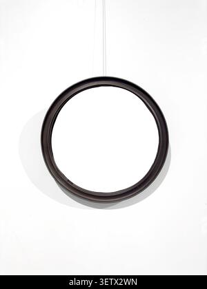 Round frame centered with empty circular interior space. Minimal border encloses blank area ready artwork insertion mockup. Contemporary design concep Stock Photo