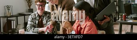 Header of Diverse Coworkers Collaborating during Team Meeting in Office Stock Photo