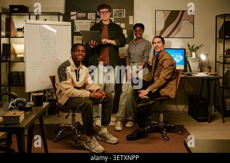 Portrait of Diverse Startup Team Posing in Office Stock Photo