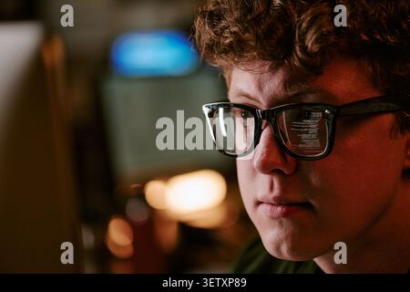 Adult Man Coding on Computer for Software Development Project Stock Photo