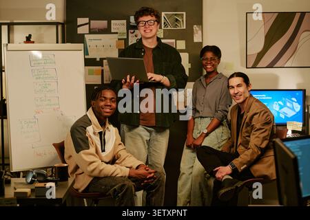 Portrait of Diverse Adult Startup Team Collaborating in Office Stock Photo