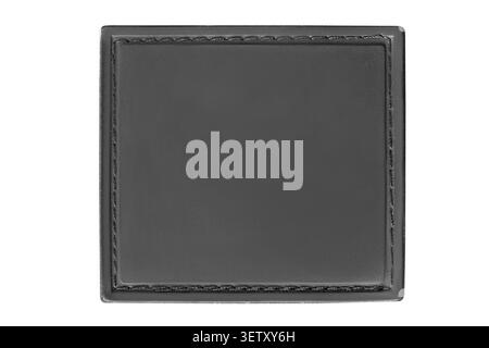 Blank black rubber stitched patch isolated on white background Stock Photo
