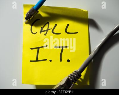Reminder note to call network technician  Stock Photo