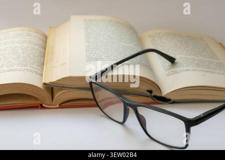 Antique Hungarian Book with Weathered Leather Cover and Aged Pages. Reading, read, glass, book Stock Photo