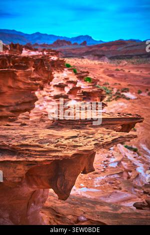 Eroded Red Sandstone Formations and Desert Landscape in Little Finland Nevada Stock Photo