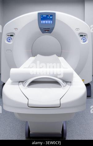 Modern hospital radiology center featuring high tech CT, MRI, or PET scanner. Advanced nuclear medicine imaging, magnetic resonance, and scintigraphy. Stock Photo