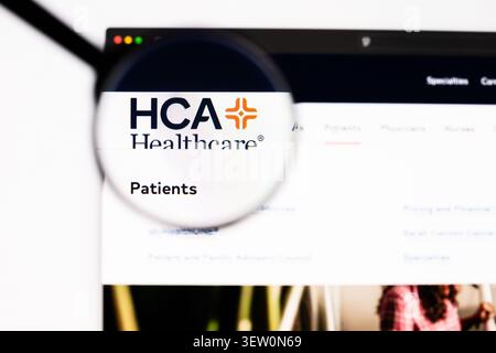 Milan, Italy 2026, 20 Apr Closeup of HCA Healthcare website on a laptop screen. Focus on HCA Healthcare logo under a magnifying glass. Stock Photo