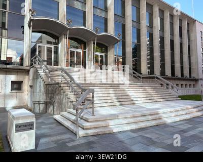 Exterior view of Manchester Crown Court, Crown Square, featuring monumental stairs and modern judicial architecture in Manchester, England. Stock Photo