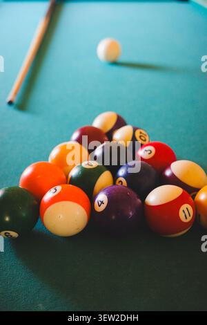 Pool Balls Arranged On Blue Billiard Table Stock Photo