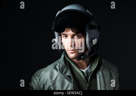 Fighter, serious and pilot with portrait of man in studio for army militant, war veteran and security. Airspace mission, aviator and space with person Stock Photo