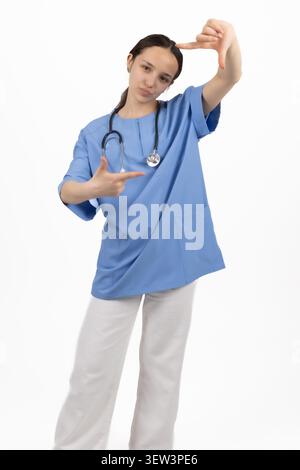 Professional female medical doctor posing inside studio environment Stock Photo