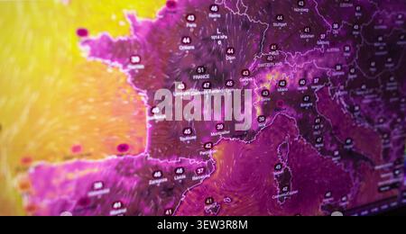 A digital weather forecast map displaying an extreme heatwave across Europe, with record-breaking high temperatures indicating severe climate change a Stock Photo