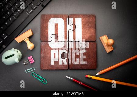 Oil price concept shown by words OIL PRICE on puzzle pieces with office objects Stock Photo