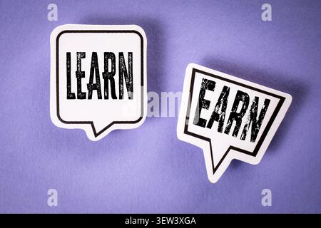 Motivational Learn and Earn message shown on speech bubbles, representing growth, education, and financial success Stock Photo