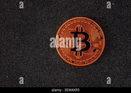 Bitcoin Golden Coin, digital Cryptocurrency Finance Concept Physical Shiny Bitcoins On dark Background Stock Photo