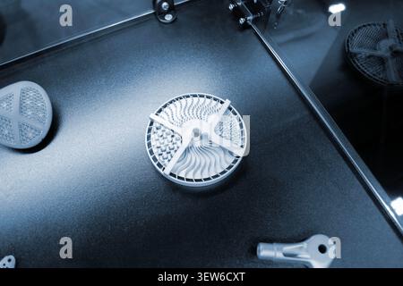 Metal object printed on 3D printer. Metal model printed on 3D printer from metal powder. Selective Laser Melting technologies. SLM. Additive new modern manufacturing technology. 3D printing technology Stock Photo