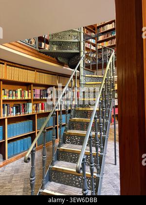 An ornate iron spiral staircase inside the historic Picton Reading Room at the Liverpool Central Library, Liverpool, UK. Stock Photo