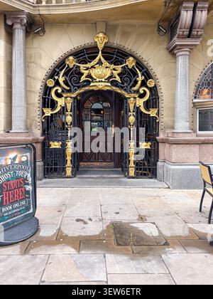 Decorative wrought iron and gold gate at The Philharmonic Dining Rooms, a Grade I listed Victorian public house on Hope Street, Liverpool, UK. Stock Photo