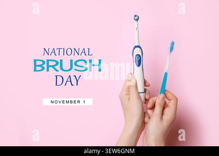 National Brush Day - November 1. Woman holding toothbrushes on pink background, closeup Stock Photo