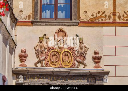 Ornate insignia on lavish gate of the hungarian noble Beniczky House on SNP town Square, the insignia displays a coat of arms of one of the familys Stock Photo