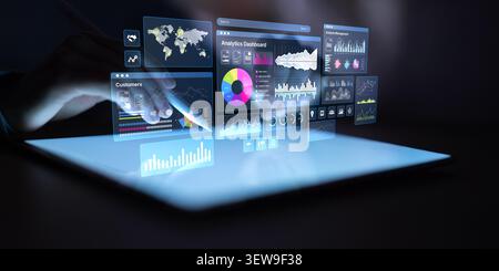 Analytics dashboard displayed on a digital tablet featuring various data visualizations and graphs for business insights Stock Photo