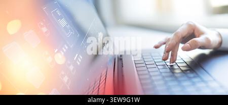 Document management system for organizing business workflows and digital file access using laptop typing Stock Photo