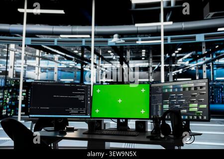 Chroma key computers in a server facility support energy consumption monitoring, automation and server room process control. Stock Photo