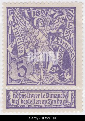BELGIUM - 1896 November 15: 5 centime deep violet postage stamp depicting allegory St. Michael and Satan, Brussels Exhibition Issue. Archangel Michael, the patron saint of Brussels, is depicted in armor while slaying a dragon. This composition highlights the city's historic emblem, with flowing banners displaying the names "Bruxelles" and "Brussel" flanking the figure under the year 1897. Historically, this imagery is linked to the 1897 Brussels International Exposition, a grand world's fair that showcased Belgium's modern industrial, commercial, and artistic achievements Stock Photo