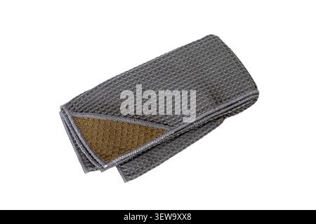 Folded Gray Microfiber Cleaning Cloth with Waffle Weave Texture Isolated on White Background with Copy Space. Stock Photo