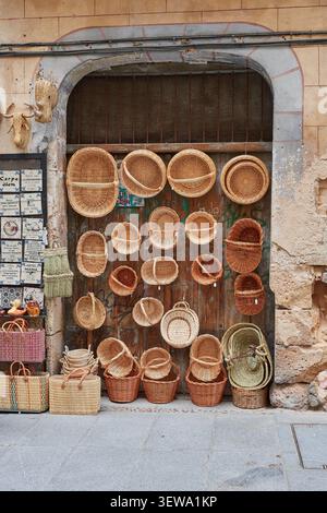 Traditional Wicker Baskets for Sale on a Historic Street in Segovia Spain Stock Photo