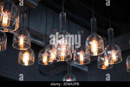 Arrangement of hanging lighting, lightbulb Stock Photo
