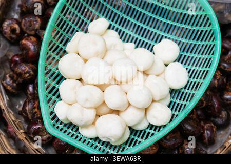 peeled water chestnuts in the basket Stock Photo