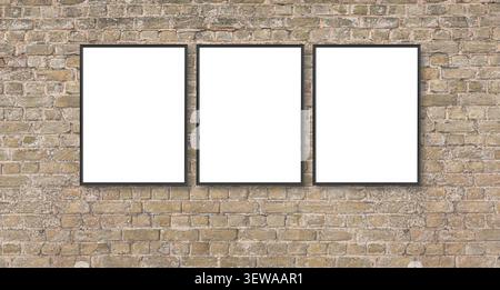 Three empty black frames displaying content on a weathered brick wall Stock Photo