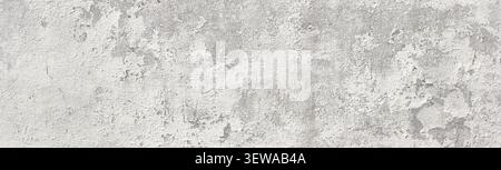 Old grunge concrete wall surface showing peeling paint and rough texture Stock Photo