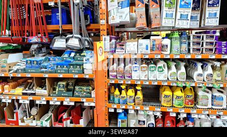 Toronto, ON, Canada - June 20, 2026: An aisle in a retail store showcasing various cleaning supplies including sponges, mops, and chemical solutions f Stock Photo