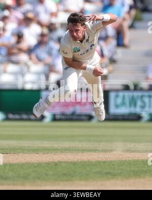 New Zealand bowler Nathan Smith, right, gestures to India's Shreyas ...
