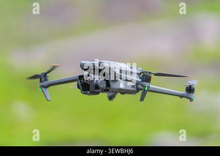 Drone hovering in flight, DJI Mavic 3 Pro Cine capturing aerial imagery. Stock Photo
