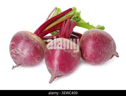 Whole and cut young beets with green leaves isolated on white Stock Photo