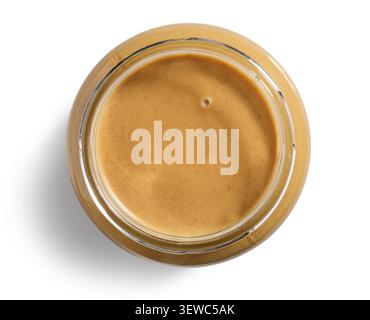 peanut butter in glass jar isolated on white background, top view Stock Photo