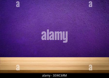 Empty wooden tabletop against a pink and red wall background. Vibrant studio mockup for product display and promotional advertising. Stock Photo