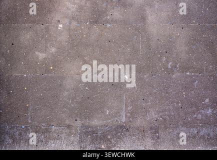 Weathered concrete wall texture with visible grain and subtle cracks Stock Photo