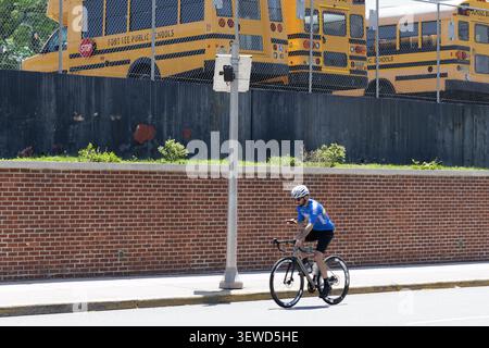Fort Lee, NJ, USA - May 17, 2026: Flock Safety AI license plate reader camera positioned near Fort Lee Public Schools bus depot, New Jersey. Stock Photo