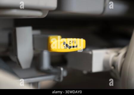 Hospital bed CPR release lever in a modern medical facility. Essential safety feature for emergency care and rapid life support response. Stock Photo