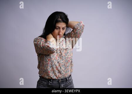 Real people expressing a range of human emotions, including thinking, success, confusion, surprise, madness, happiness, joy Stock Photo
