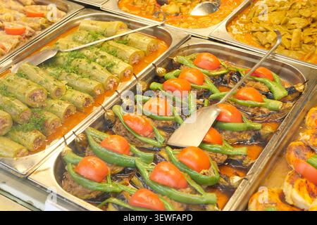 Delicious dishes on display at a local market stall Stock Photo